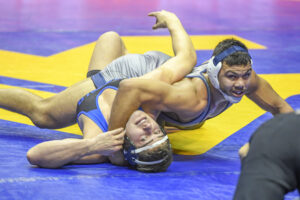 Adams, Hall advance to Big 12 championship semifinals